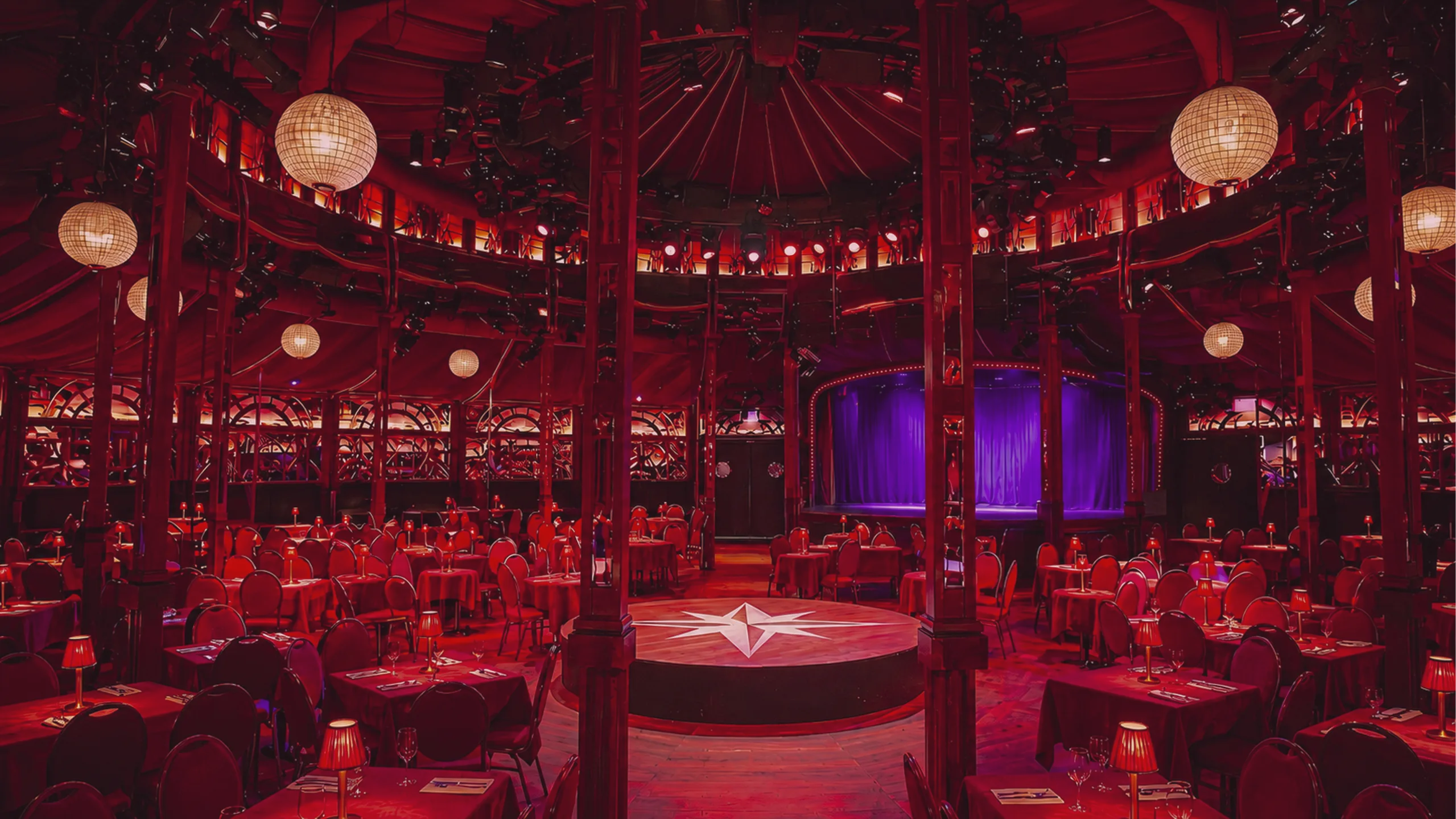 Tables and seats inside the Belgian Spiegeltent